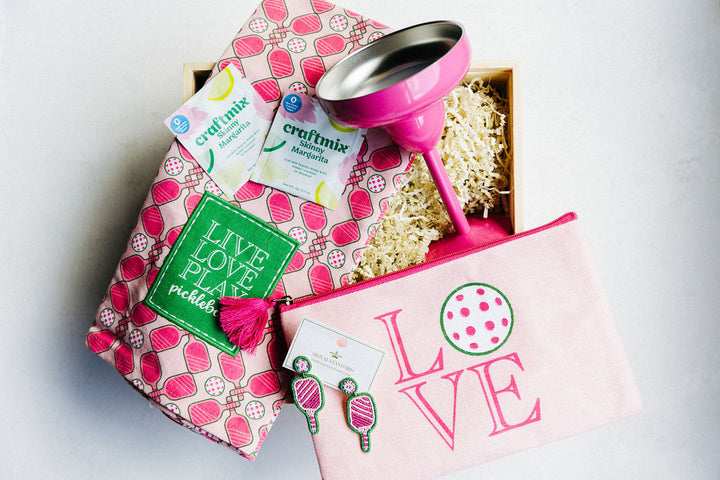 Dink and Drink pickleball gift box styled with LOVE pouch, towel, earrings, and margarita glass in keepsake wooden box