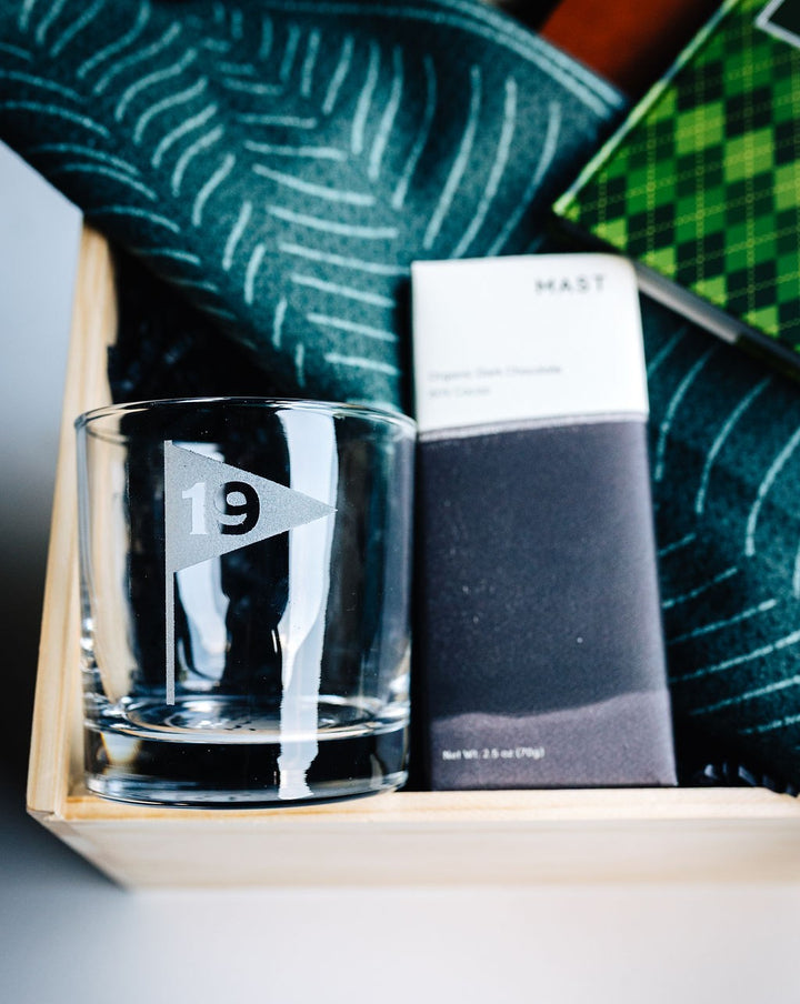Dark chocolate bar, golf towel, and golfer’s pocket book from The 19th Hole gift box