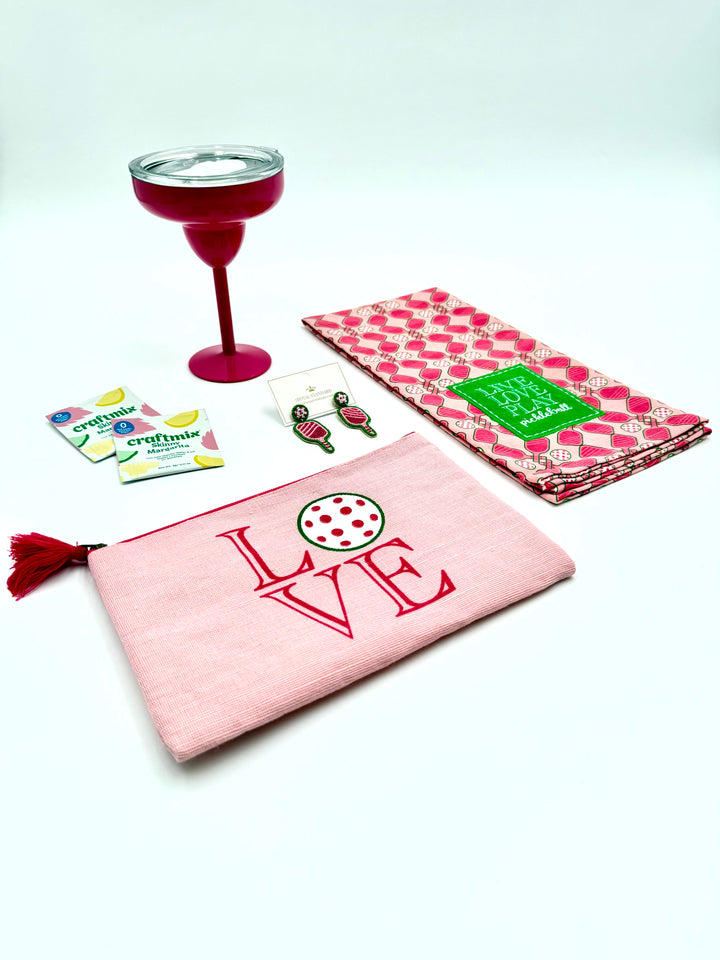 Dink and Drink pickleball gift set with margarita glass, LOVE cosmetic bag, towel, earrings, and Craftmix margarita packets.