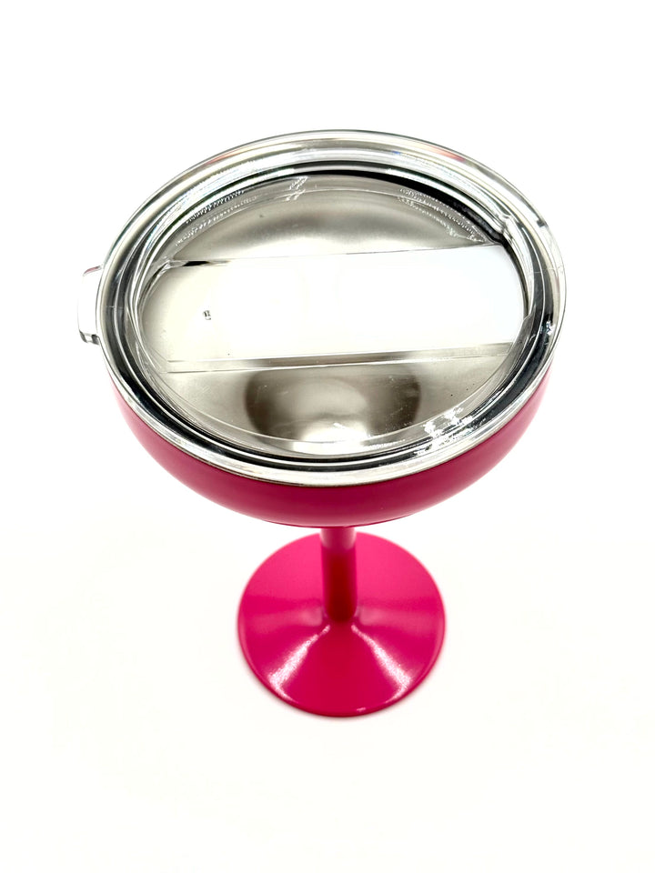 Overhead view of pink insulated margarita glass with lid included in Dink and Drink gift box