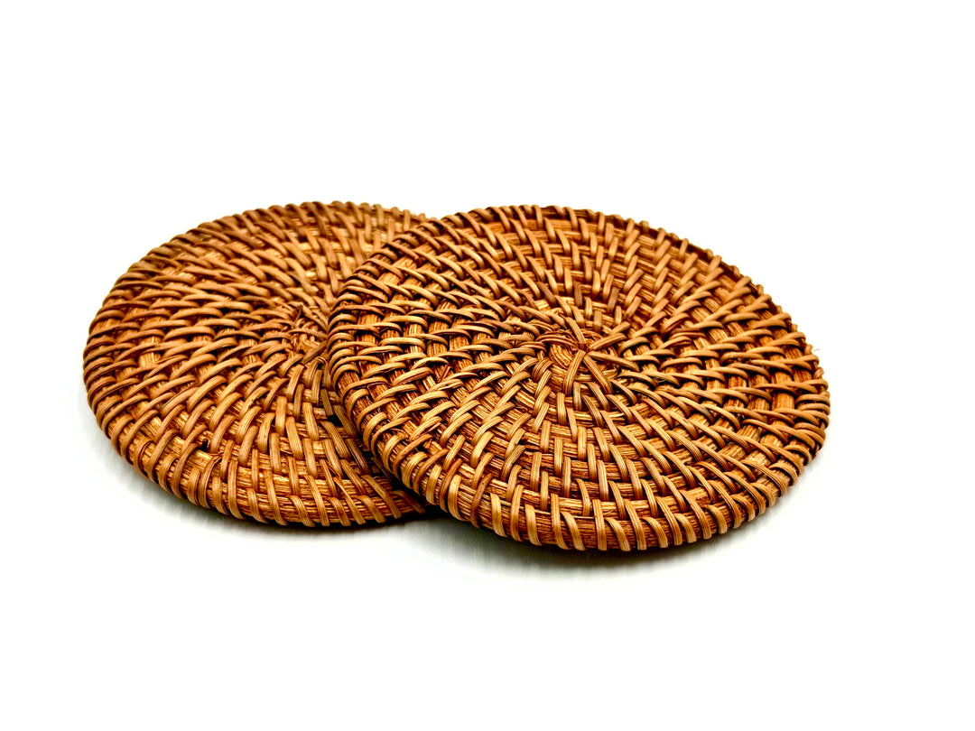 Two woven rattan coasters