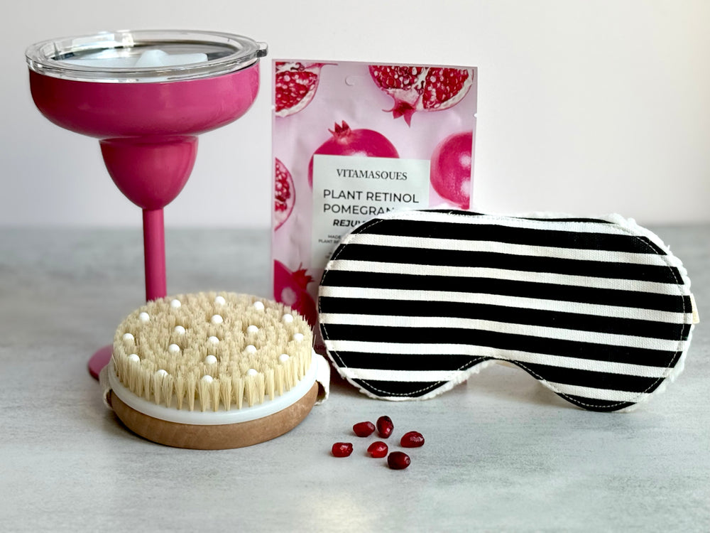 curated gift box for her with pink cocktail glass and spa items